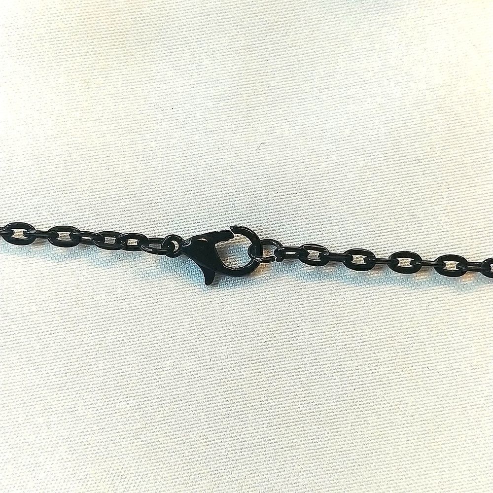 Vintage magnetic charm necklace. 26 inch. Comes with 4 charms. - Picture 5 of 6